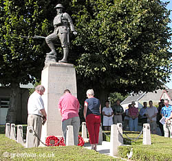 Members of a battlefield tour lay wreaths at the 41st Division Memorial at Flers on the Somme battlefield.