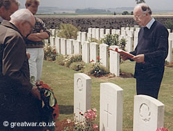 Visiting a grave on the 1916 Somme battlefield.